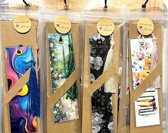 This is a vintage-style bookmark featuring a watercolor-inspired botanical design and a coordinating tassel.