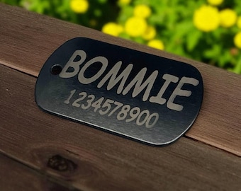 This is a custom-engraved black Aluminum military-style pet ID tag.