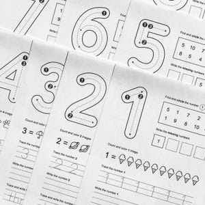 May include: Black and white educational worksheets for early learning. The worksheets feature large numbers with dotted lines for tracing, along with counting and writing exercises. The pages are designed to help children learn numbers and basic math skills.