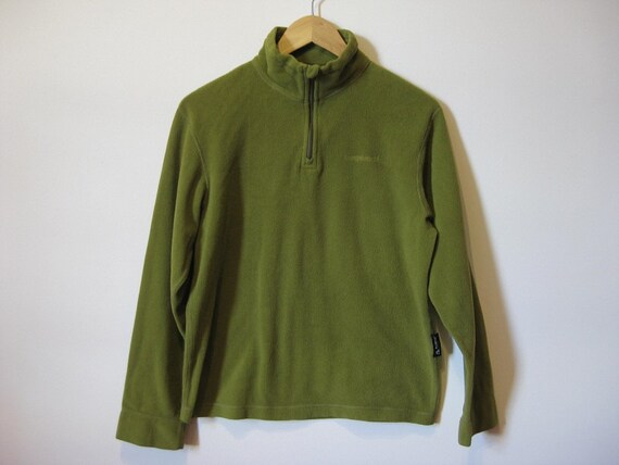 green fleece jumper