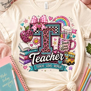 May include: A cream-coloured t-shirt featuring a large letter T with a pink leopard print, a pink gingham bow, a stack of books, a pencil-filled mug labelled Teach Love Repeat, a yellow school bus, a rainbow, and the word Teacher in script.
