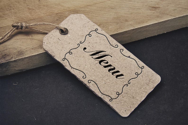 May include: A brown paper tag with a decorative border and the word "Menu" written in cursive.