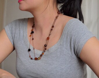 Black and orange long necklace in antique copper chain