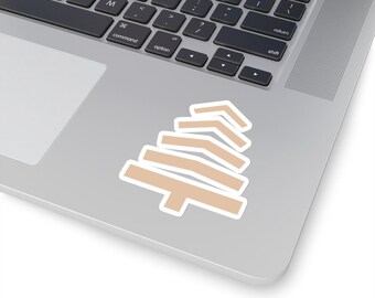 Może przedstawiać: Naklejka z abstrakcyjnym drzewem w kolorze beżowym na srebrnym laptopie.