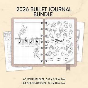 May include: A bullet journal bundle for 2026, featuring a beige cover and pages with black and white illustrations. The journal includes a mood tracker and a page with the numbers 2026. A5 size is 5.8 x 8.3 inches, A4 is 8.5 x 11 inches.