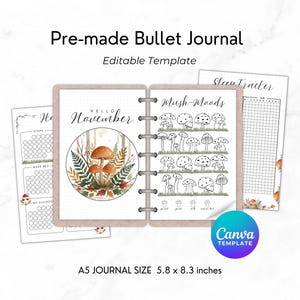 May include: A5 size pre-made bullet journal with a mushroom theme. The journal is open, revealing pages with the text "Hello November" and "Mush-Moods". The journal measures 5.8 x 8.3 inches.