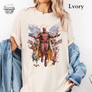 Ivory Comfort Colors t-shirt highlighting Funny Deadpool as Jesus, a unique and comedic Marvel superhero mashup. Premium soft cotton with a smooth finish, oversized fit, and pre-shrunk fabric for durability. A perfect superhero shirt for Deadpool fans, Marvel movie lovers, and those who enjoy irreverent humor. Great for casual wear, comic conventions, and fans of Deadpool’s unpredictable, hilarious, and rebellious nature. The perfect mix of pop culture, sarcasm, and superhero absurdity.