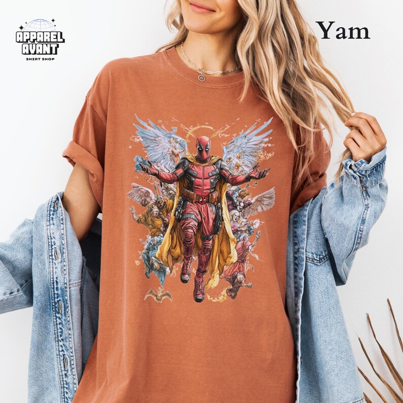 Yam Comfort Colors t-shirt featuring Funny Deadpool as Jesus, an outrageous and witty Marvel superhero parody. Durable, heavyweight cotton with a worn-in feel, breathable fabric, and a loose fit for everyday comfort. A stylish Deadpool 3 movie tee for comic collectors, Marvel fans, and lovers of satirical superhero humor. Designed for those who appreciate Deadpool’s mix of action, comedy, and over-the-top storytelling. A must-have for anyone who enjoys breaking the fourth wall in true Deadpool.