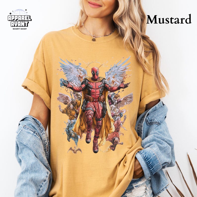 Comfort Colors graphic t-shirt featuring Funny Deadpool as Jesus, a laugh-out-loud Marvel parody design. Heavyweight, ultra-soft cotton with a crisp look, relaxed fit, and vintage-style print for a standout aesthetic. The ultimate Deadpool 3 movie shirt for fans of comedic superheroes, unconventional humor, and Marvel’s most unpredictable antihero. Ideal for lovers of sarcasm, meme culture, and Deadpool’s wild, rule-breaking personality. A hilarious addition to any Marvel fan’s collection.