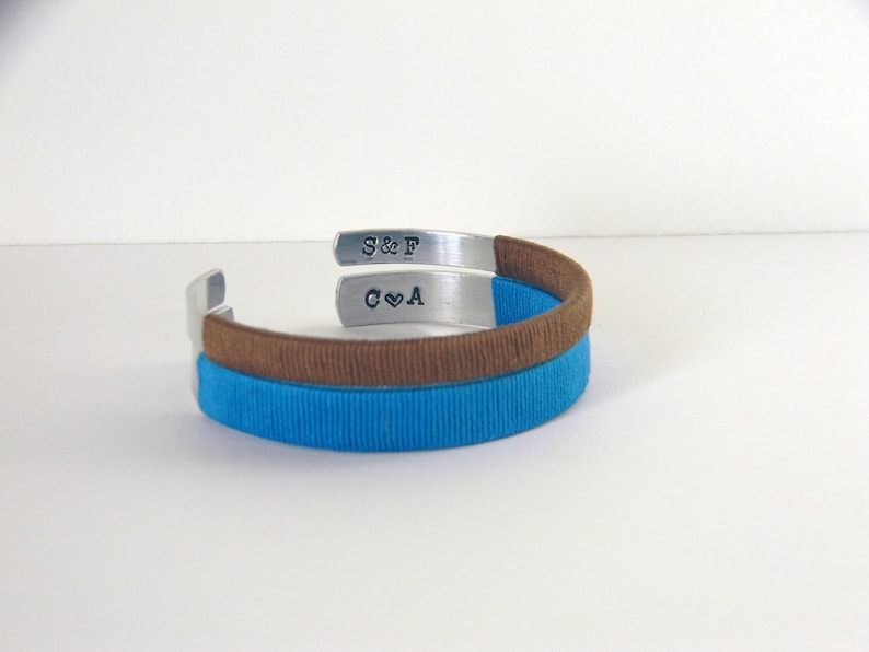 Cotton anniversary gift. Metal and cotton bracelets with personalized engraving in the inner sides. Wrapped with cotton thread. Second wedding anniversary.