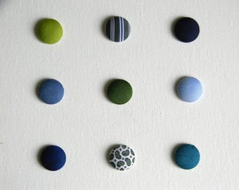 Green lapel pin. Blue buttonhole brooch. Fabric round boutonniere. Office wear. Classic style.
