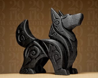 May include: A black dog sculpture with detailed carvings. The dog is in a standing position, with its tail curved upwards. The sculpture has decorative patterns on its body and head, and is made of a solid material.