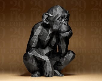 Figura geométrica de mono impresa en 3D para decoración del hogar