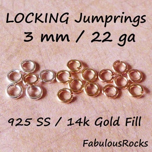 May include: A close-up of 3 mm, 22 gauge locking jump rings in sterling silver and 14k gold fill. The jump rings are arranged in two groups, one of silver and one of gold. The text "LOCKING Jumprings 3 mm / 22 ga 925 SS / 14k Gold Fill FabulousRocks" is visible below the jump rings.