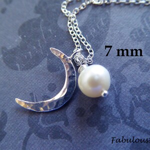 May include: A silver crescent moon charm necklace with a 7 mm white pearl pendant. The charm has a hammered texture.