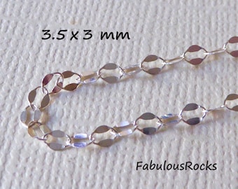 May include: Silver chain with oval links, measuring 3.5 x 3 mm.  FabulousRocks.