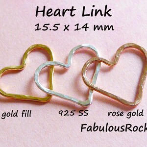May include: Three heart-shaped links in gold fill, sterling silver, and rose gold fill. Each link measures 15.5 mm by 14 mm. Heart Link. FabulousRocks.