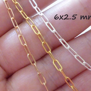 May include: Three chains in gold, silver and rose gold are shown in a close-up image. The chains are made of small, rectangular links. The text "6x2.5 mm" is visible in the image.