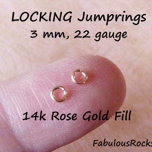 May include: Two 3 mm, 22 gauge locking jump rings in 14k rose gold fill.  The jump rings are shown on a finger.