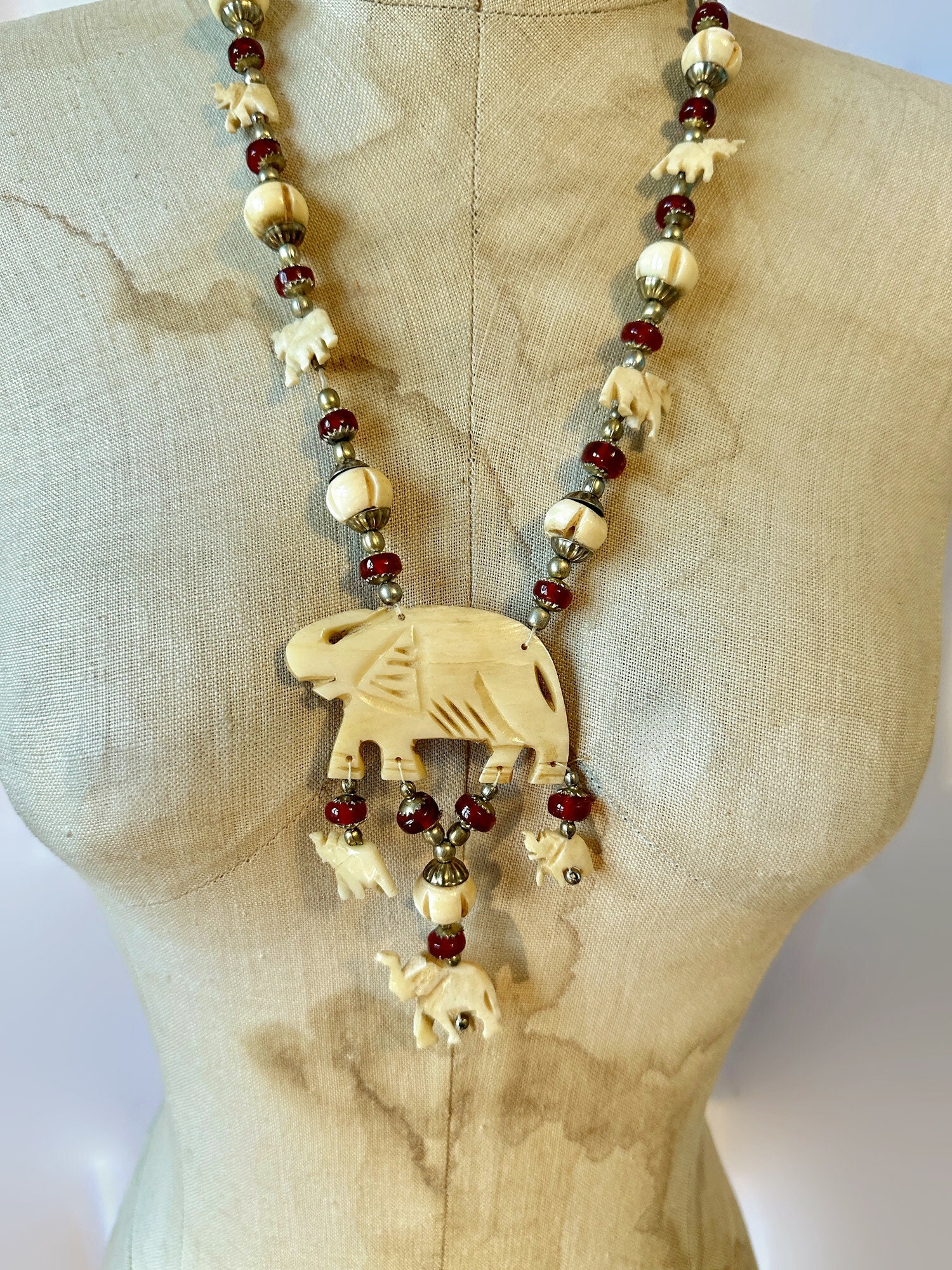 Elephant bone necklace deals