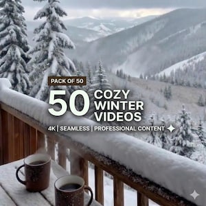 May include: A scenic winter landscape with snow-covered trees and mountains. The image features the text "PACK OF 50" and "50 COZY WINTER VIDEOS". Two mugs of coffee sit on a snow-covered wooden surface.