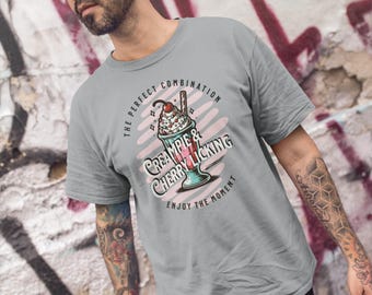 Camiseta gráfica divertida con doble sentido: batido de leche con creampie y lamiendo cerezas. Humor dulce y picante
