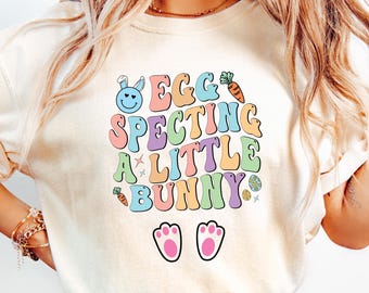 Camiseta con anuncio de embarazo de Pascua, camiseta con la frase "Eggspecting A Little Bunny", sudadera de maternidad de Pascua, regalo de Pascua para futuras mamás, camiseta de conejo