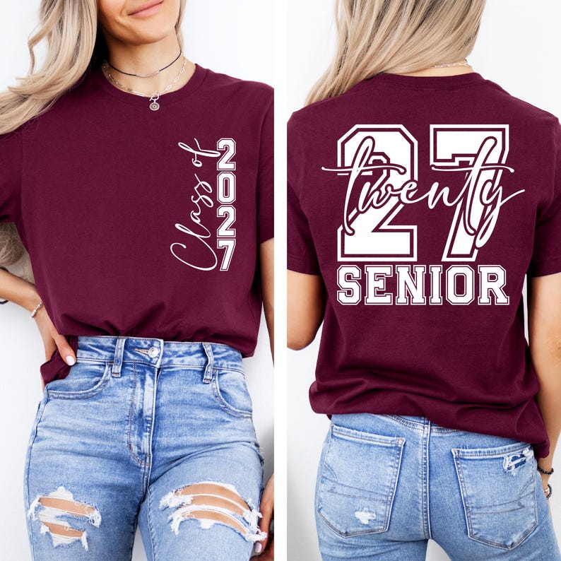 May include: Maroon t-shirt with white text. The front of the shirt says "Class of 2027" in a script font. The back of the shirt says "27 Twenty Senior" in a block font.
