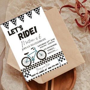 May include: A birthday party invitation with the text "LET'S RIDE!" and a bicycle illustration. The invitation includes the name "Mathew", the date, time, and location. Black and white checkered flag designs border the top and bottom. The invitation is on a white card.