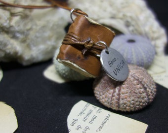Necklace with handmade miniature books