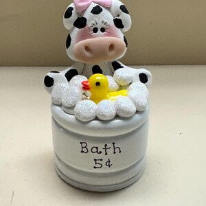 Cow in a bathtub