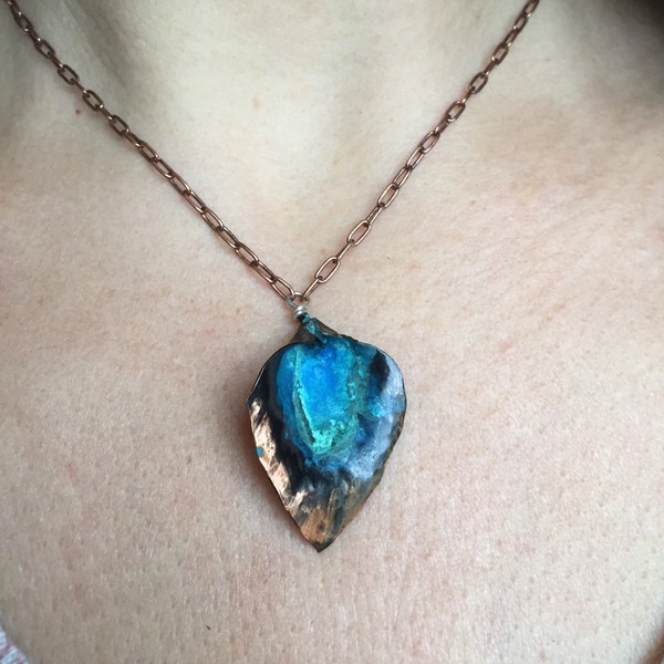 Small copper lily necklace with Caribbean blue over black patina