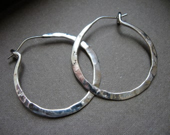 Simple light weight hoop in sterling silver