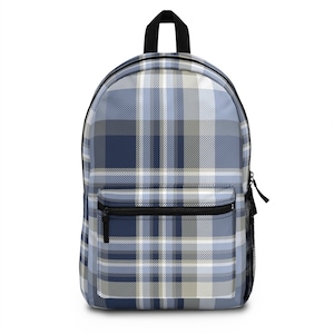 May include: A backpack featuring a blue, white, and gray plaid pattern. The bag includes a large main compartment, a smaller front zippered pocket, a black top handle, and a black mesh side pocket. The zippers and trim are black.