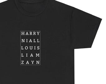 May include: Black t-shirt with the names "HARRY", "NIALL", "LOUIS", "LIAM", and "ZAYN" printed in white, arranged vertically within a white rectangle. The shirt is made of a soft material.