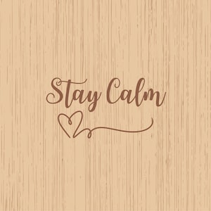 May include: A light brown background with a wood grain texture. The words "Stay Calm" are written in a cursive font in a darker brown color, with a heart symbol underneath.
