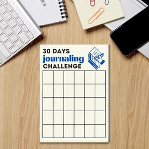 May include: A white printable 30-day journaling challenge tracker with a blue and white illustration of a hand writing in a book. The text "30 DAYS journaling CHALLENGE" is printed in blue.
