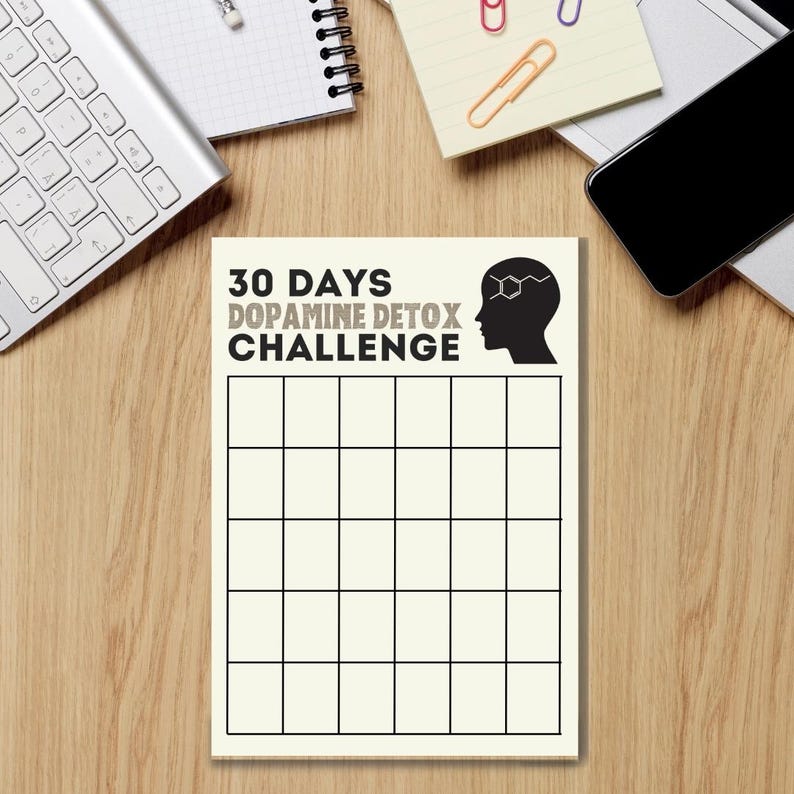 May include: A printable 30-day dopamine detox challenge tracker with a black silhouette of a head with a chemical structure inside. The tracker has 30 squares for each day of the challenge.
