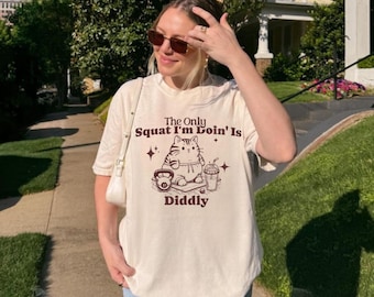 The Only Squat I'm Doin' Is Diddly Shirt, Funny Cowboy cat Tee, Lazy Gym Western Humor Shirt, Sarcastic Country Diddly Squat Gift