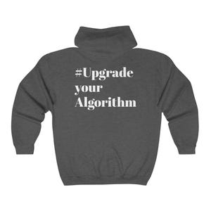 May include: A charcoal grey zip-up hoodie featuring the white text "#Upgrade your Algorithm". The hoodie has a hood and a full-length zip. The material looks soft and comfortable.