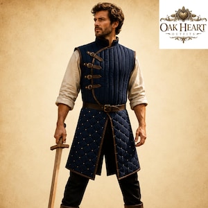 May include: A dark blue quilted vest featuring a high collar, brown leather trim, and four side-buckle closures. The lower section has a diamond-stitched pattern with small metal studs. The garment is worn over a light beige long-sleeve shirt.