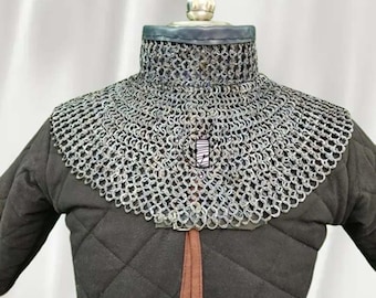 Platt nitad titanring med ringbrynja, medeltida halsskydd