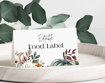 May include: Editable Food Label printable card with a watercolor design of pumpkins, leaves, and flowers in shades of green, white, orange, and burgundy.