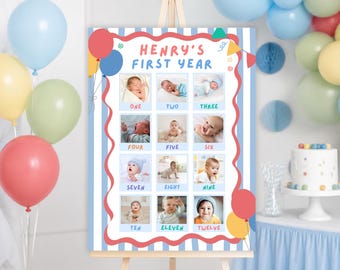 May include: A rectangular sign titled Henry's First Year featuring twelve square photographs of a baby, each labeled with a month from one to twelve. The sign has a blue and white striped background with a red wavy border and colorful balloon graphics.