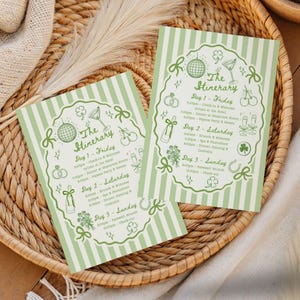May include: Two green and white striped itinerary cards with illustrations of a disco ball, cocktail, and champagne bottle. The cards have the text "The Itinerary" and event details for Friday, Saturday, and Sunday.