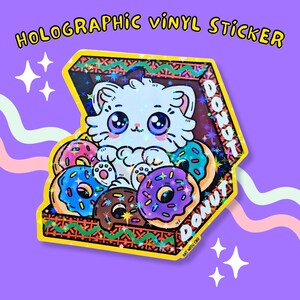 Sticker chat dans une boîte en forme de beignet - Sticker en vinyle holographique fait main mignon pour amoureux des chats, ordinateur portable, bouteille d'eau, journal intime, téléphone, chat blanc mignon