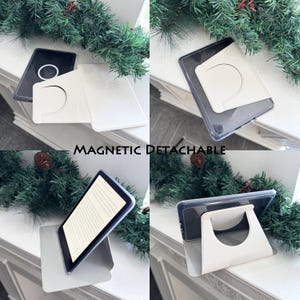 K&ouml;nnte beinhalten: Eine wei&szlig;e, magnetisch abnehmbare Tablet-H&uuml;lle mit St&auml;nderfunktion. Die H&uuml;lle wird in verschiedenen Positionen gezeigt, darunter flach und aufrecht. Der Text "MAGNETIC DETACHABLE" ist im Bild sichtbar.