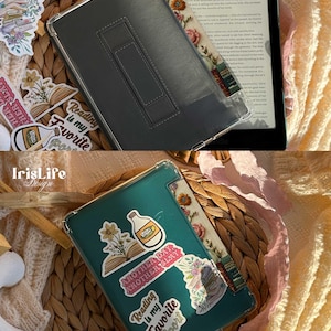 May include: Two clear phone cases with a teal and black background. The cases have various stickers on them, including a book with flowers, a bottle of soda, and a stack of books. The text on the stickers reads "Reading is my favorite sport" and "Another day, another slay".