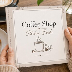 May include: A square sticker book with a light beige cover featuring the text Coffee Shop Sticker Book in black and brown script and serif fonts. The cover includes a line drawing of a steaming coffee cup, coffee beans, and leaves.