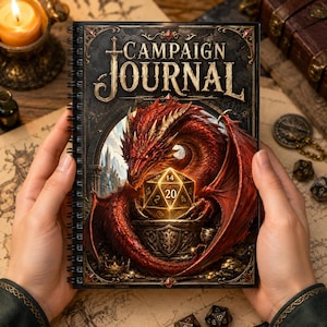 May include: A spiral-bound Campaign Journal featuring a dark, ornate cover with the text CAMPAIGN JOURNAL at the top. The artwork displays a large, detailed red dragon coiled around a golden twenty-sided die, set against a stone archway background.